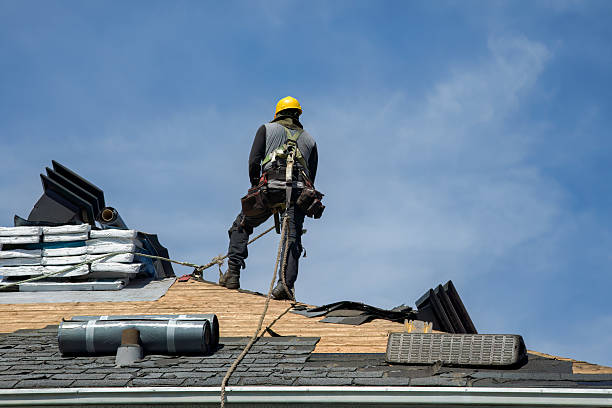 Professional Roof Replacement technician working in Pinehurst, MA